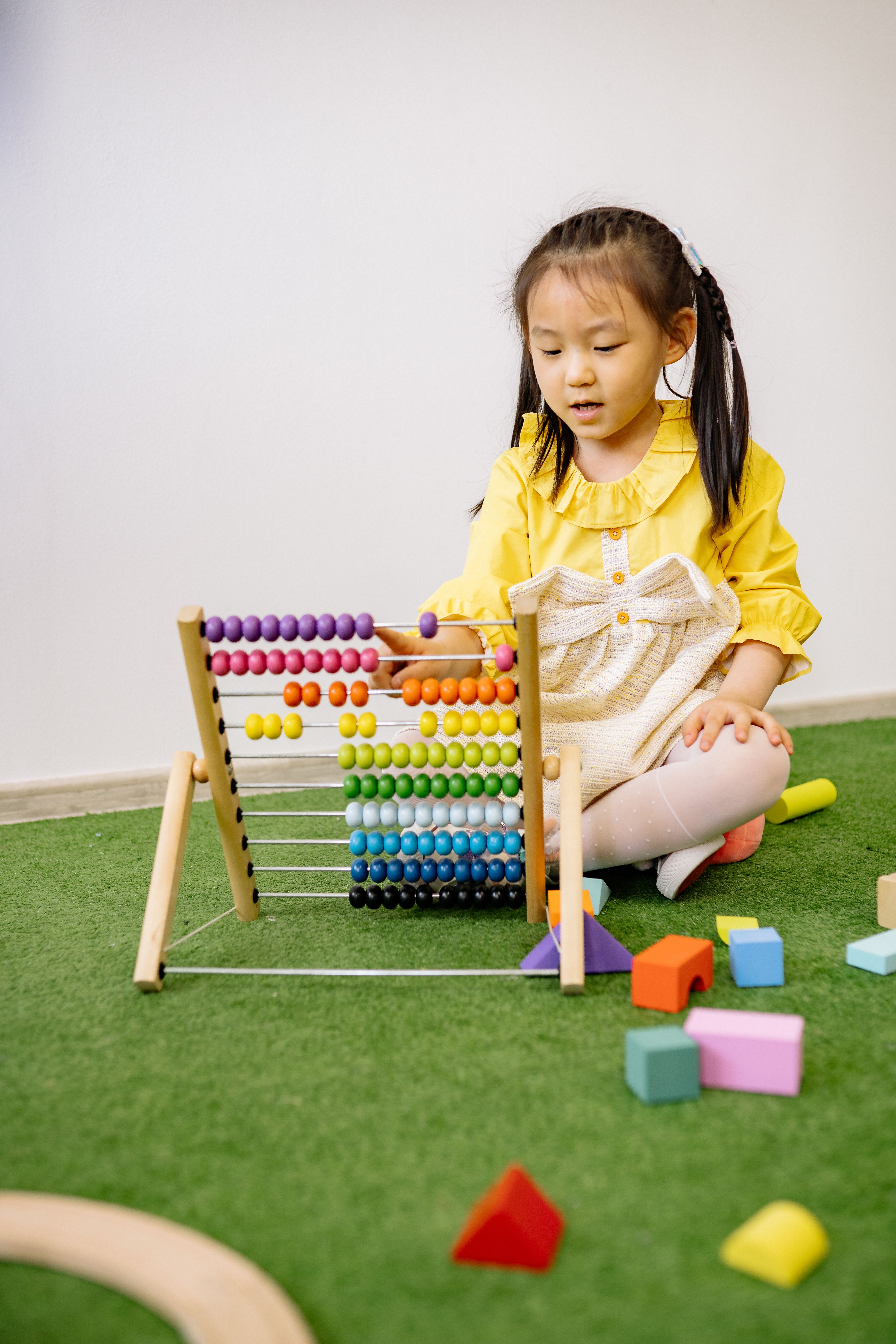 Nursery children learning through play at Birla Open Minds Preschool, Kalaburagi.
